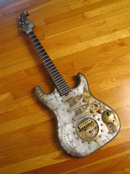 40/50 Guitar on wood front Picture