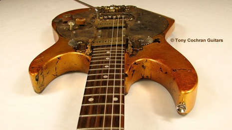 Tony Cochran Rising Sun guitar top edge front Picture