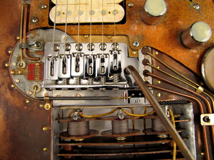 The Quick electric guitar detail bridge front Picture