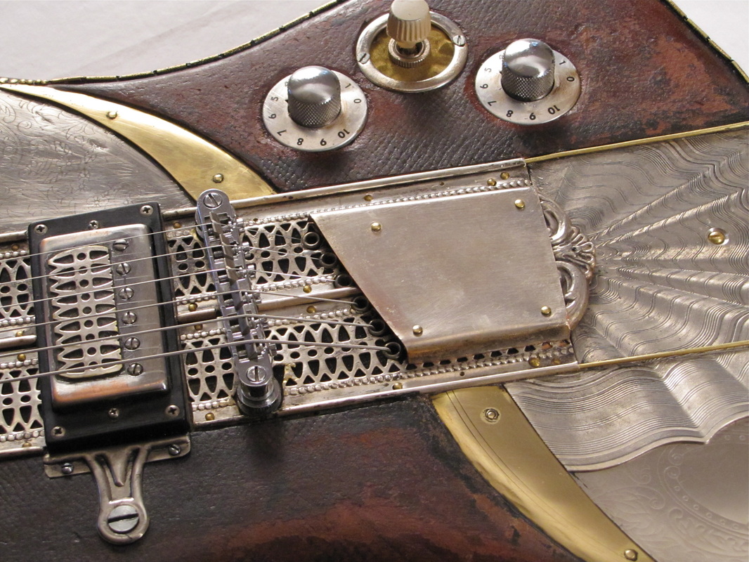 Sandpiper electric guitar detail left bottom Picture
