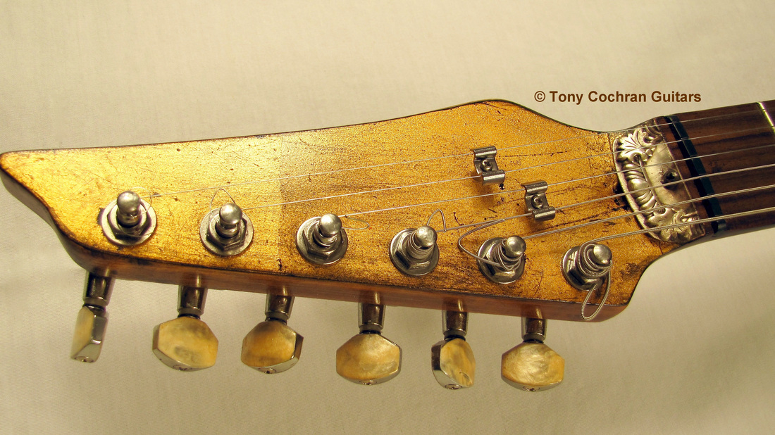 Tony Cochran Rising Sun guitar head front Picture