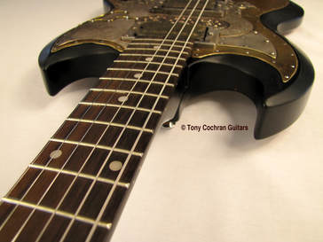 Doubloon guitar #71 top edge front Picture